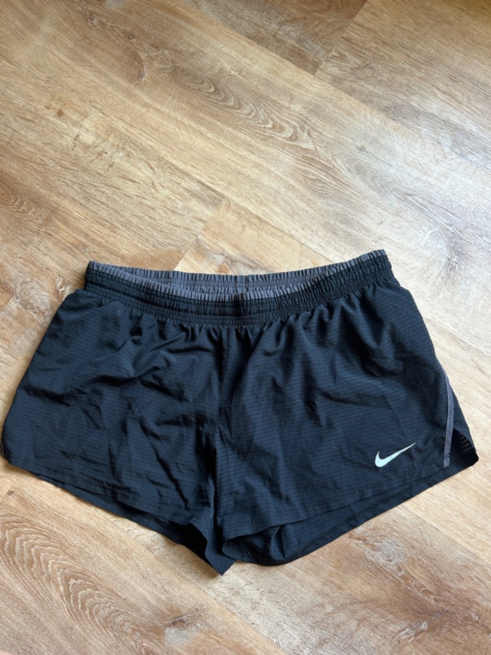 Nike Women’s Black Athletic Shorts with White Swoosh